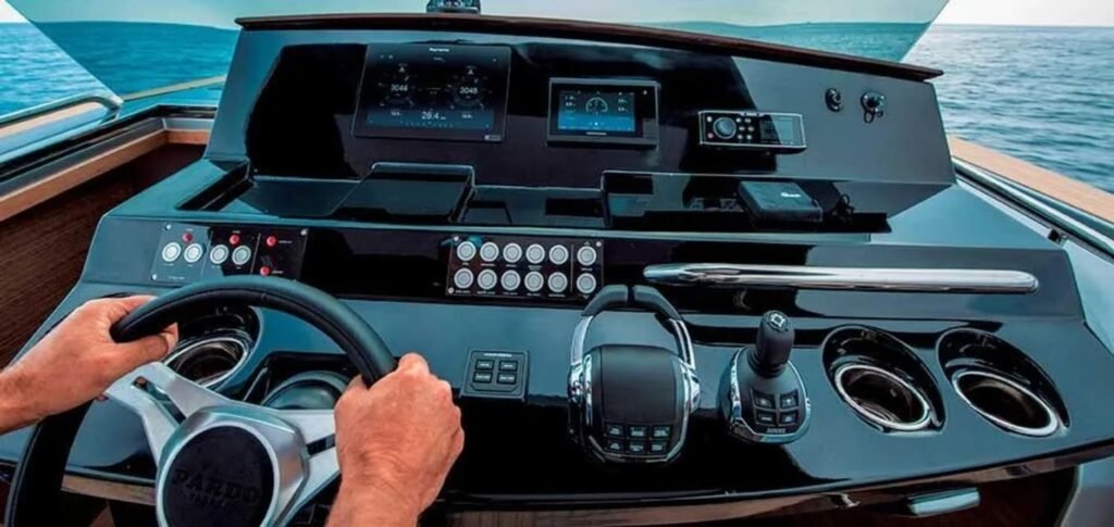 High-tech control panel and steering wheel of the yacht, designed for seamless navigation.