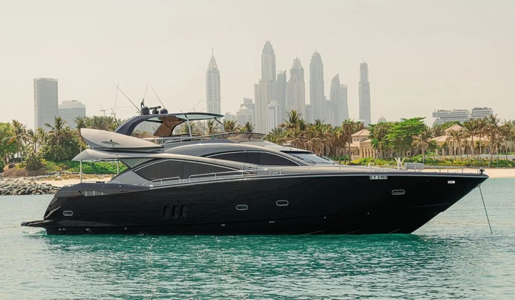 Side view of the 82' Sunseeker luxury yacht, showcasing its sleek and elegant design.
