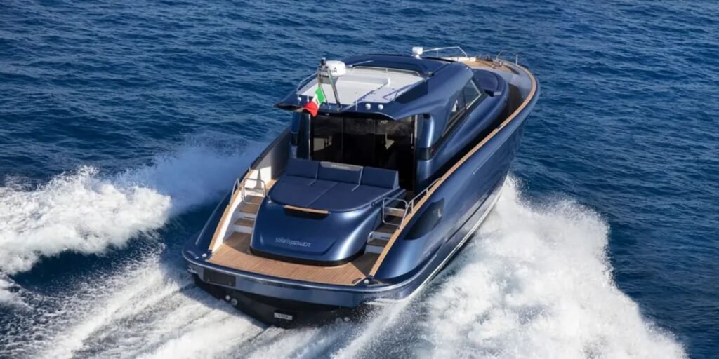 Rear angle of the yacht, emphasizing its spacious outdoor areas and luxurious features.