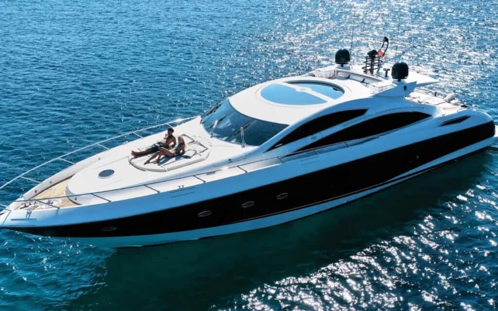 Aerial shot of the 82' Sunseeker luxury yacht cruising on the water.