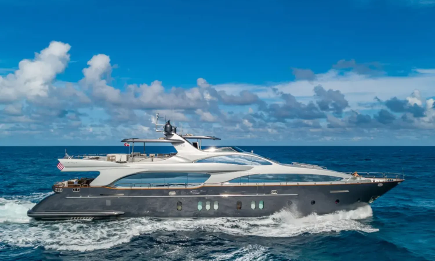 Bahamas 13 Side view of the 116' AZIMUT luxury yacht, showcasing its sleek design and elegant lines.