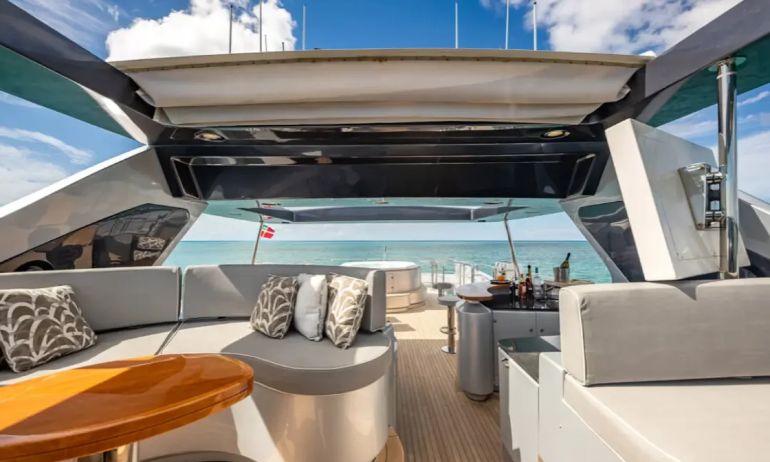 Bahamas 15 Luxurious master suite on the 116' AZIMUT yacht, featuring a king-size bed, modern décor, and ambient lighting.