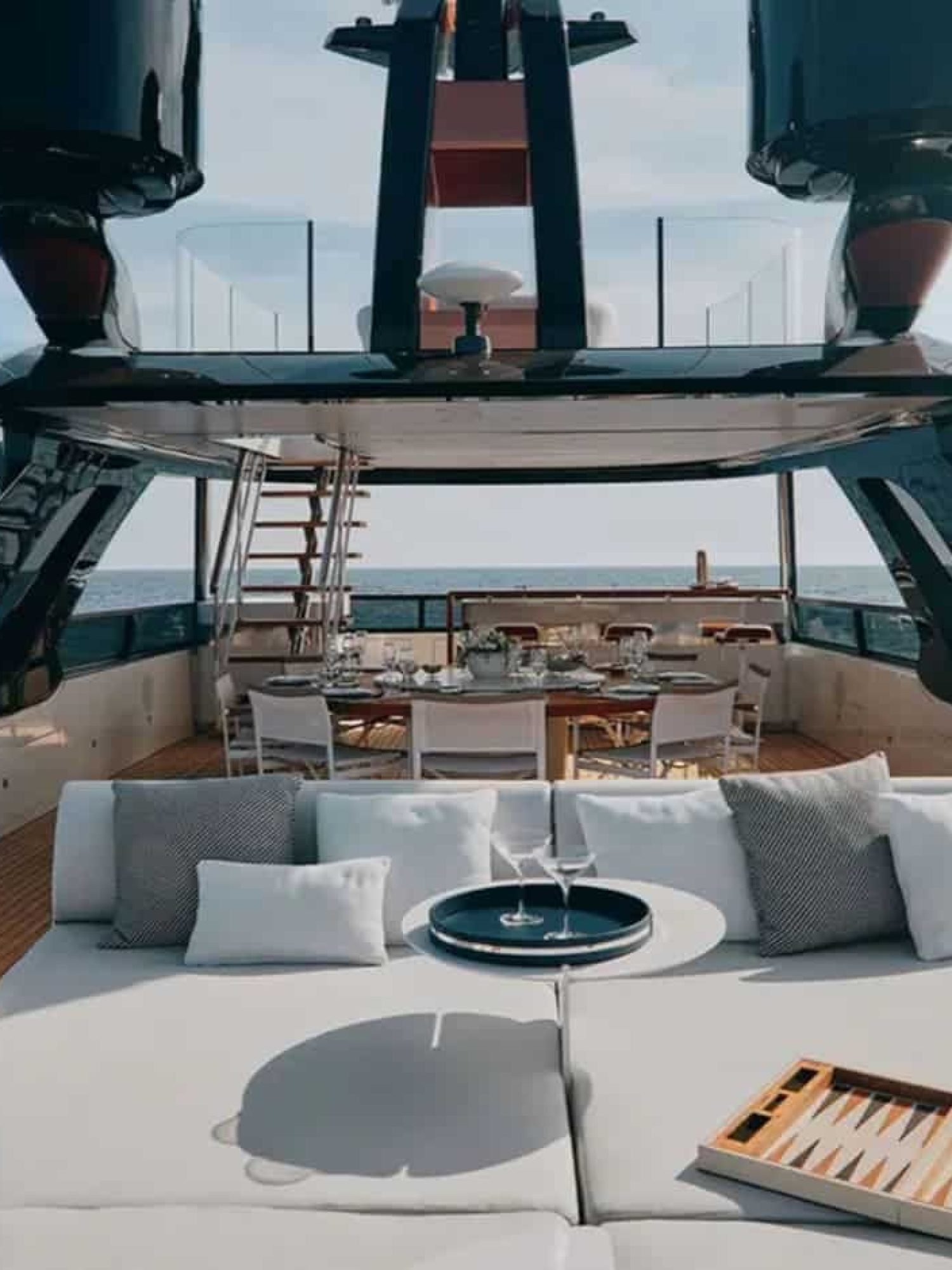 Spacious outdoor deck area of the 125' Benetti yacht, perfect for relaxation and entertainment.