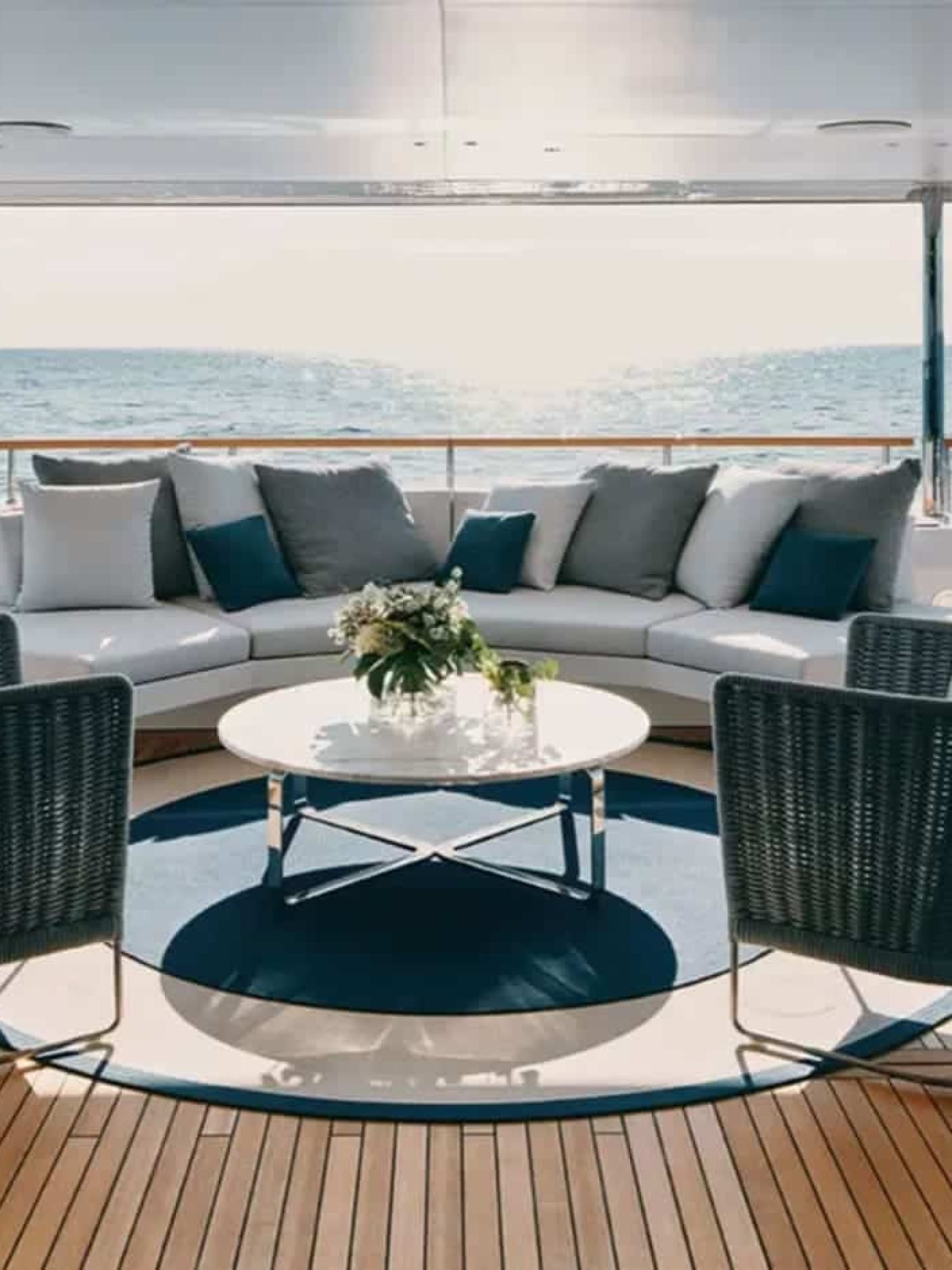 Cozy and stylish outdoor sofa setup on the yacht for a perfect lounging experience.