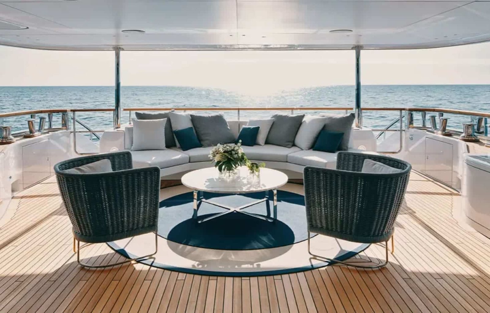 Cozy and stylish outdoor sofa setup on the yacht for a perfect lounging experience.