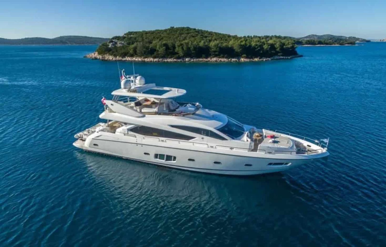 Elegant 80' Sunseeker yacht available for charter, showcasing its stunning design.