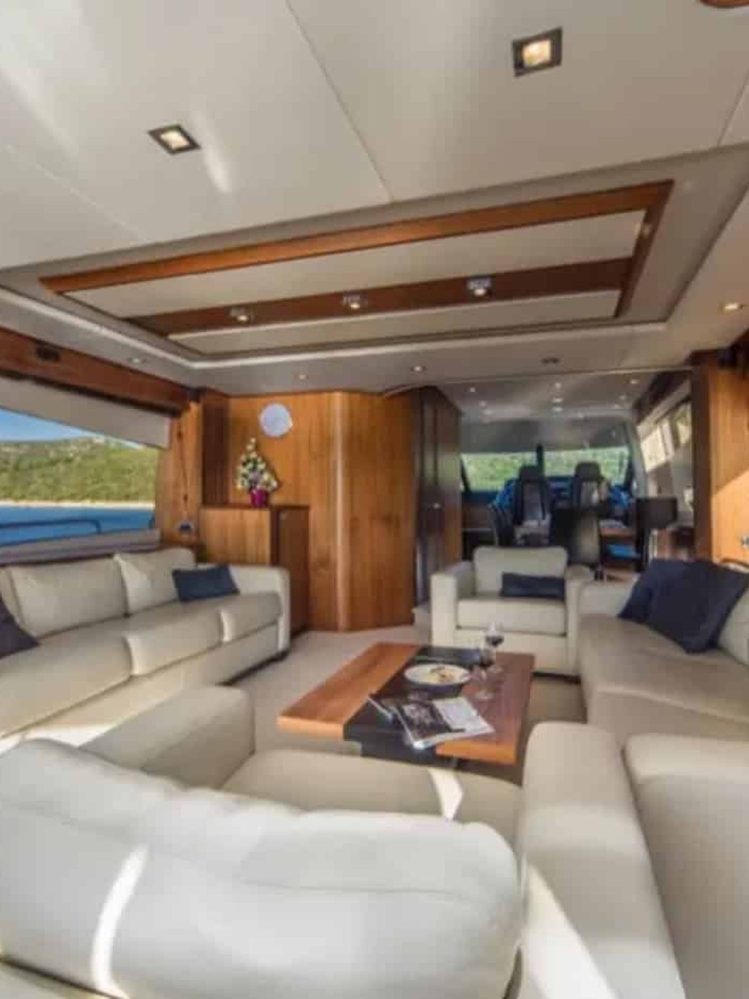 Sophisticated indoor dining area on the 80' Sunseeker yacht, designed for comfort and style.