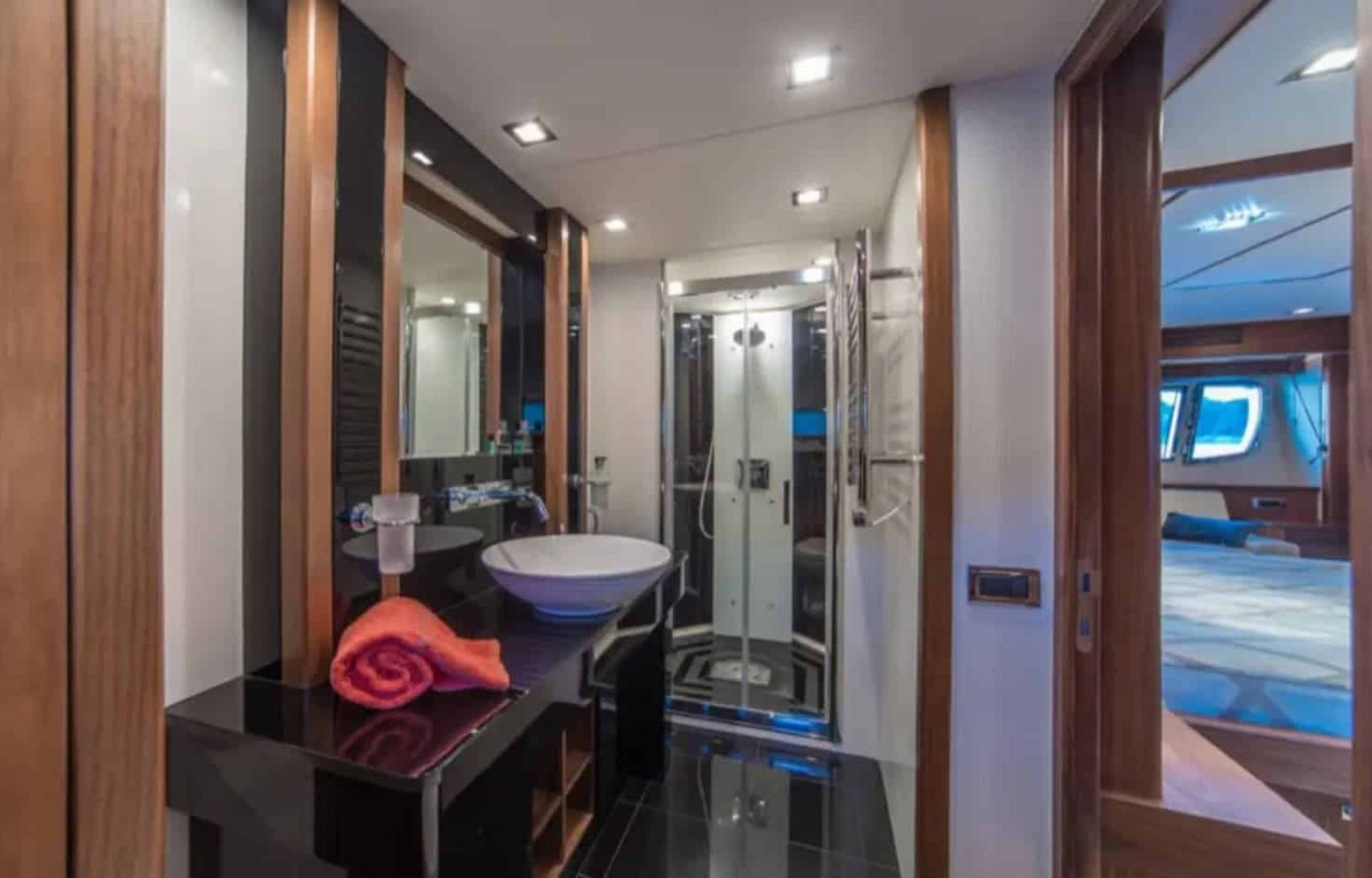 Modern en-suite bathroom inside the yacht, featuring premium finishes.