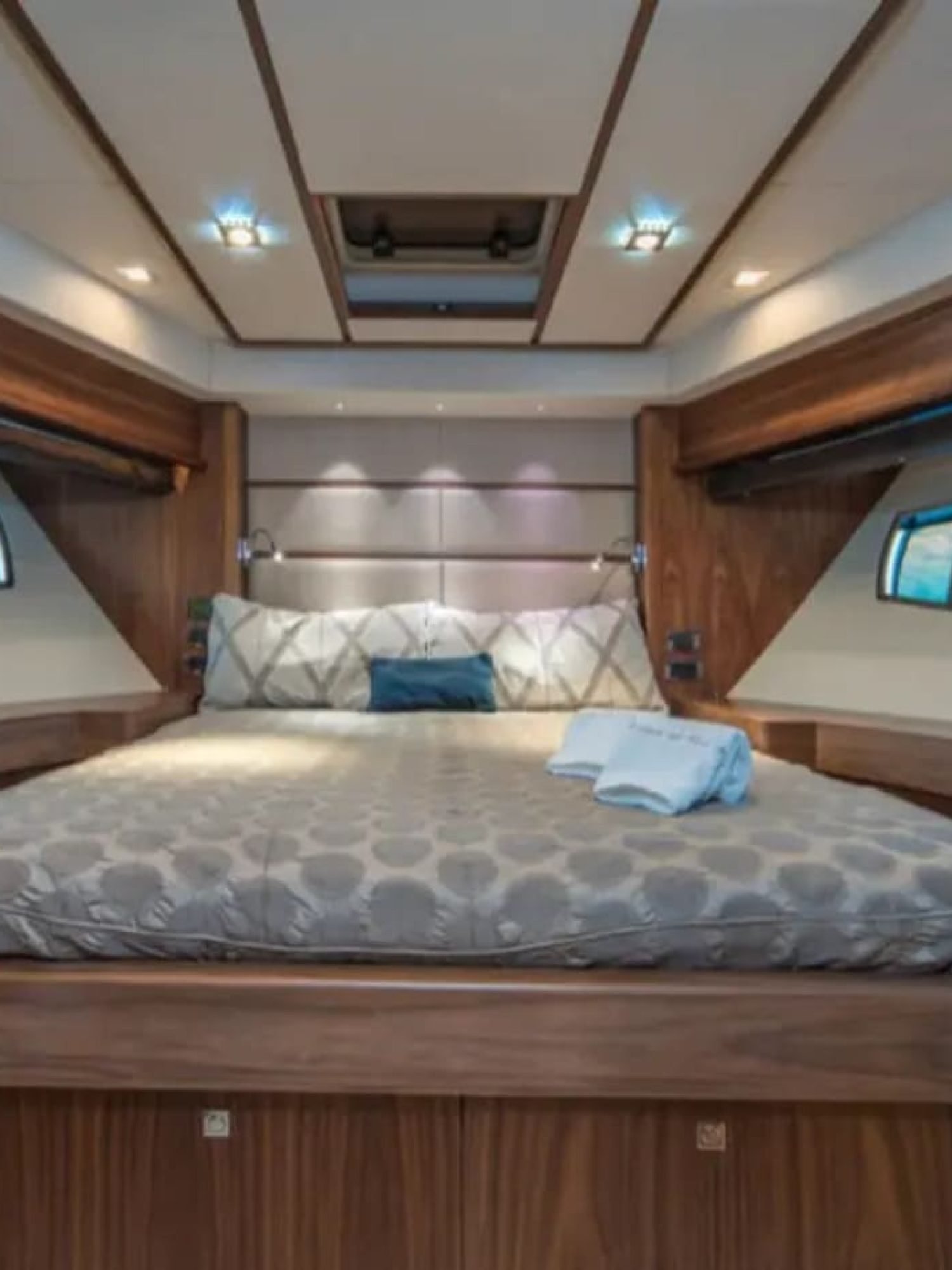 "A comfortable guest cabin inside the yacht, offering premium amenities.