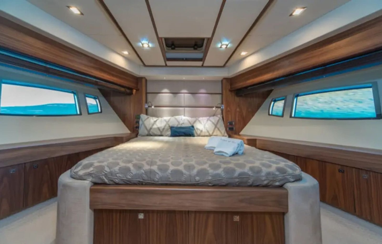 "A comfortable guest cabin inside the yacht, offering premium amenities.