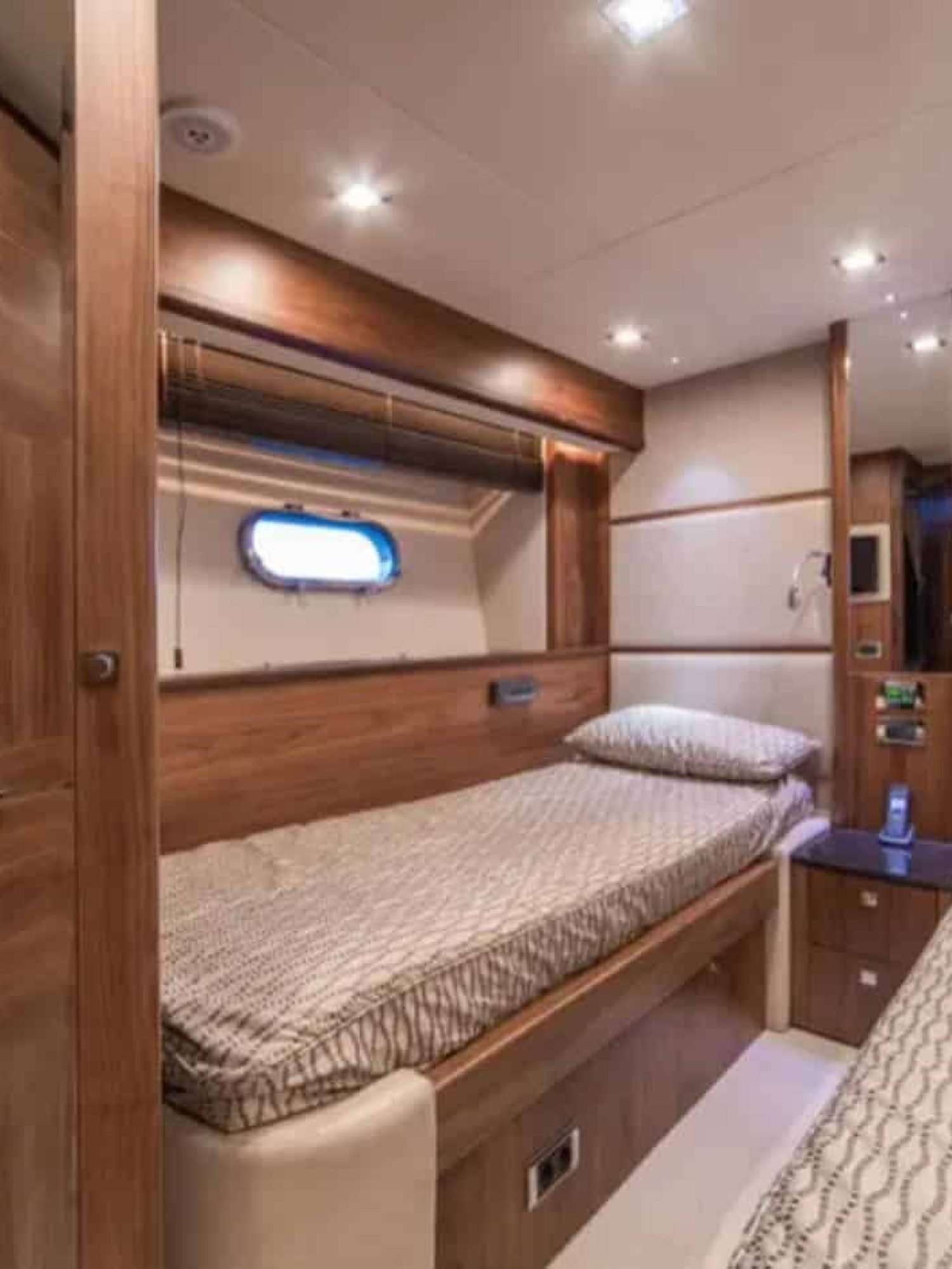 Cozy twin bed cabin on the yacht, ideal for guests or children.