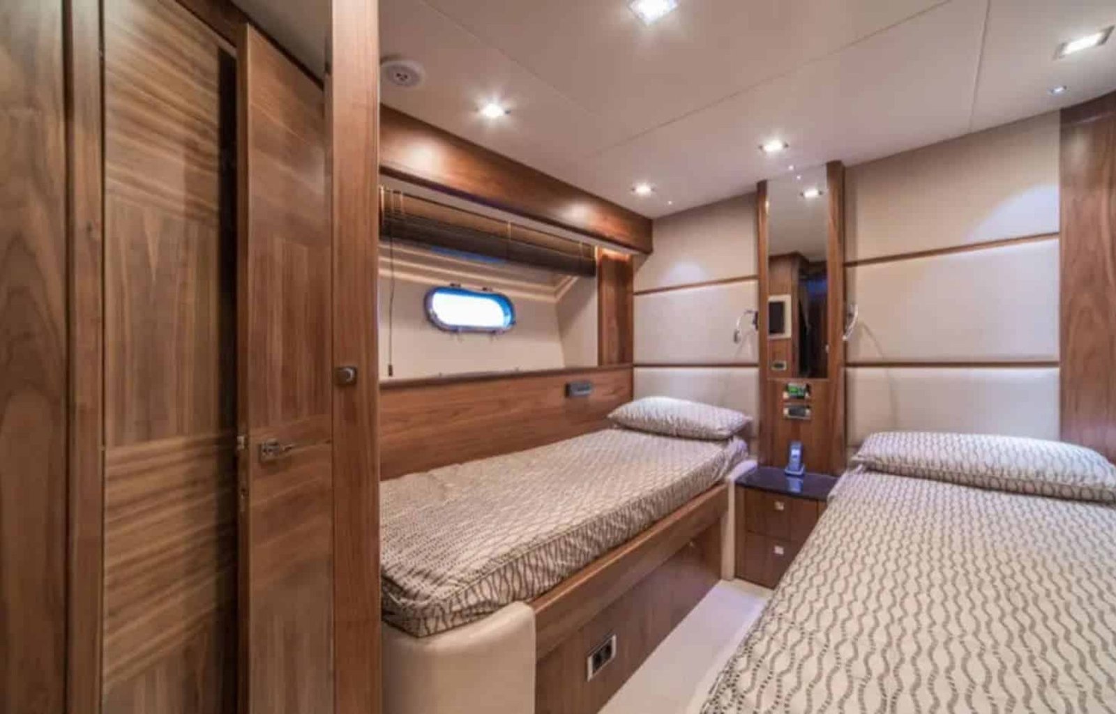 Cozy twin bed cabin on the yacht, ideal for guests or children.