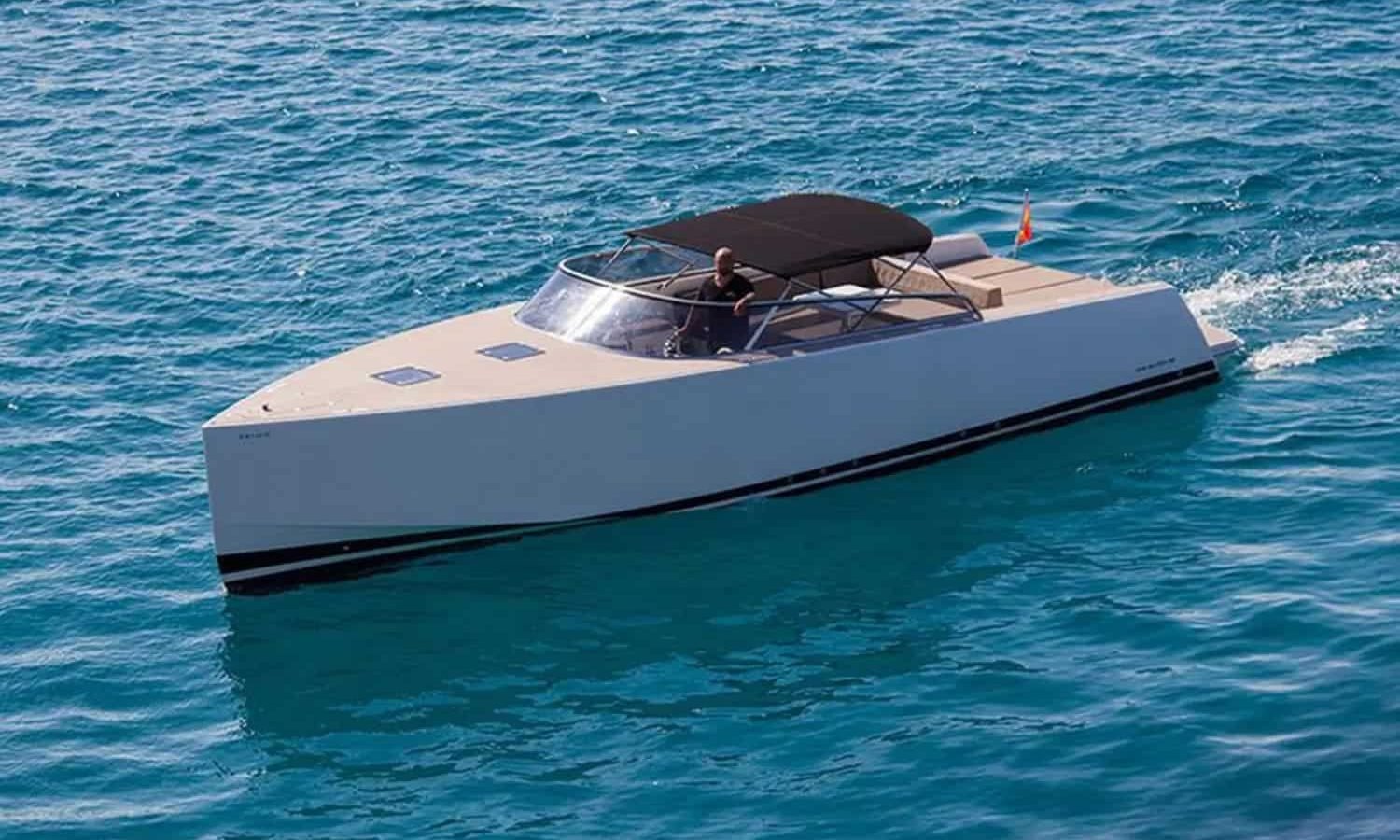 Ibiza 7 Sleek 40' Vandutch yacht cruising in Ibiza’s crystal-clear waters.