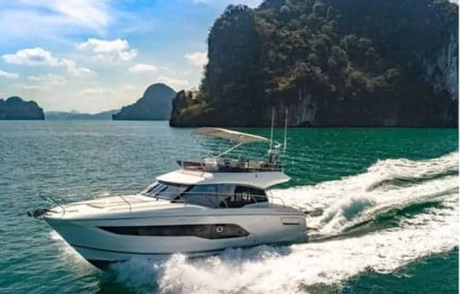 Front view of the 42' Prestige yacht for charter, showcasing sleek design and elegance on the water.