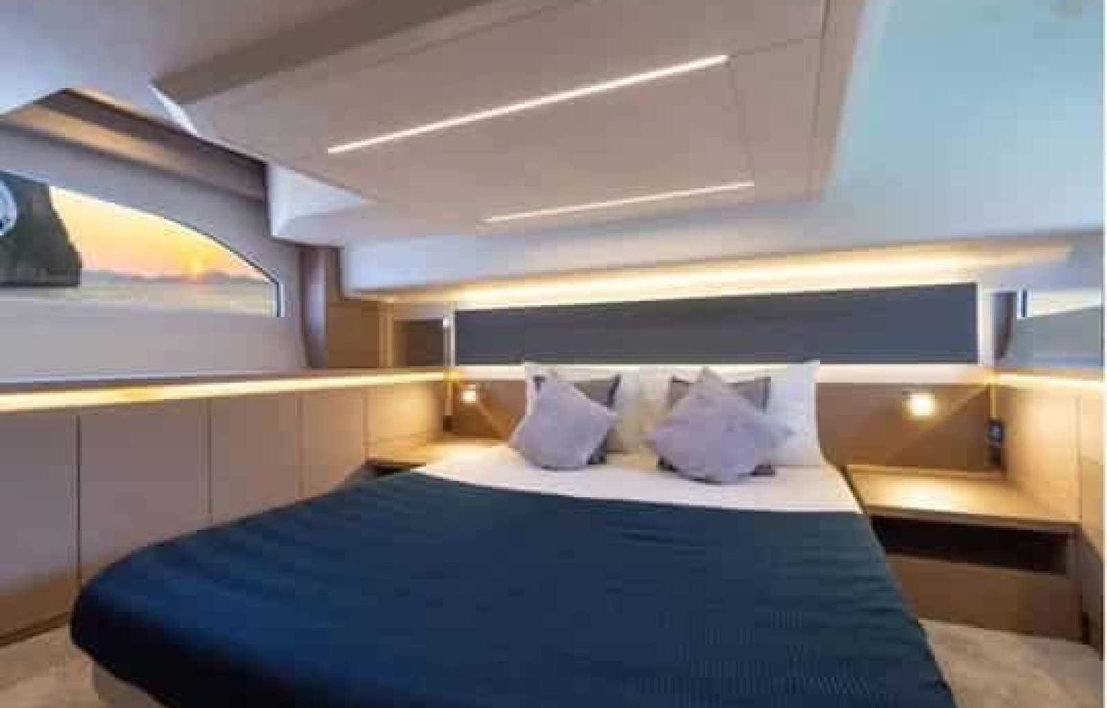 Cozy and stylish bedroom inside the 42' Prestige yacht, featuring premium bedding and modern design.