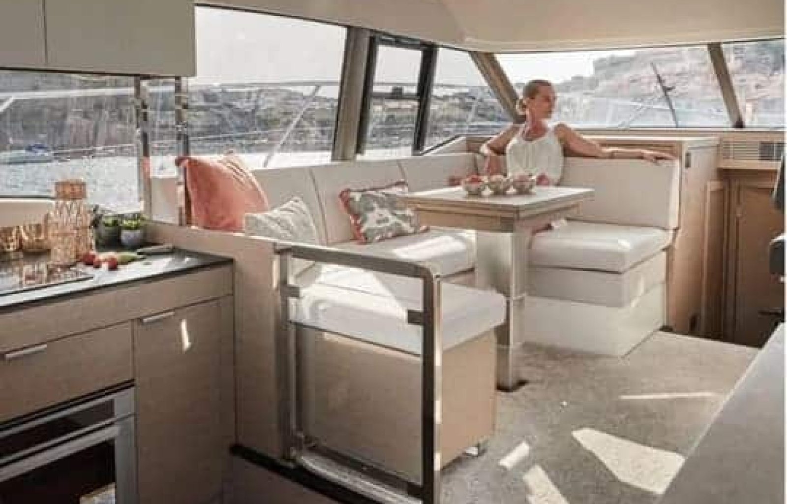 "Luxury dining area inside the 42' Prestige yacht, featuring a stylish table setup and premium finishes.