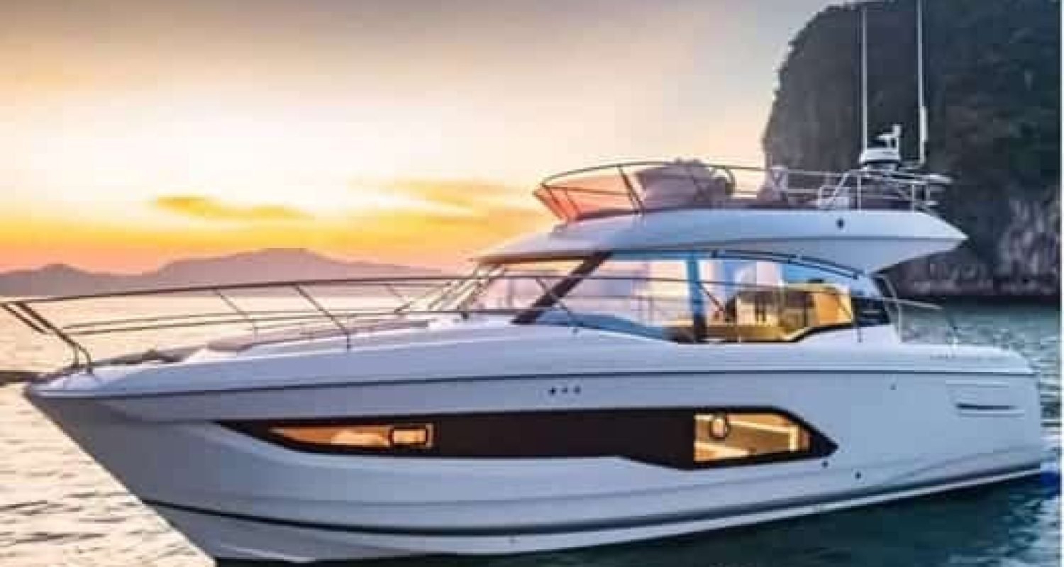 42' Prestige yacht illuminated by golden sunlight, creating a stunning luxury yachting experience.