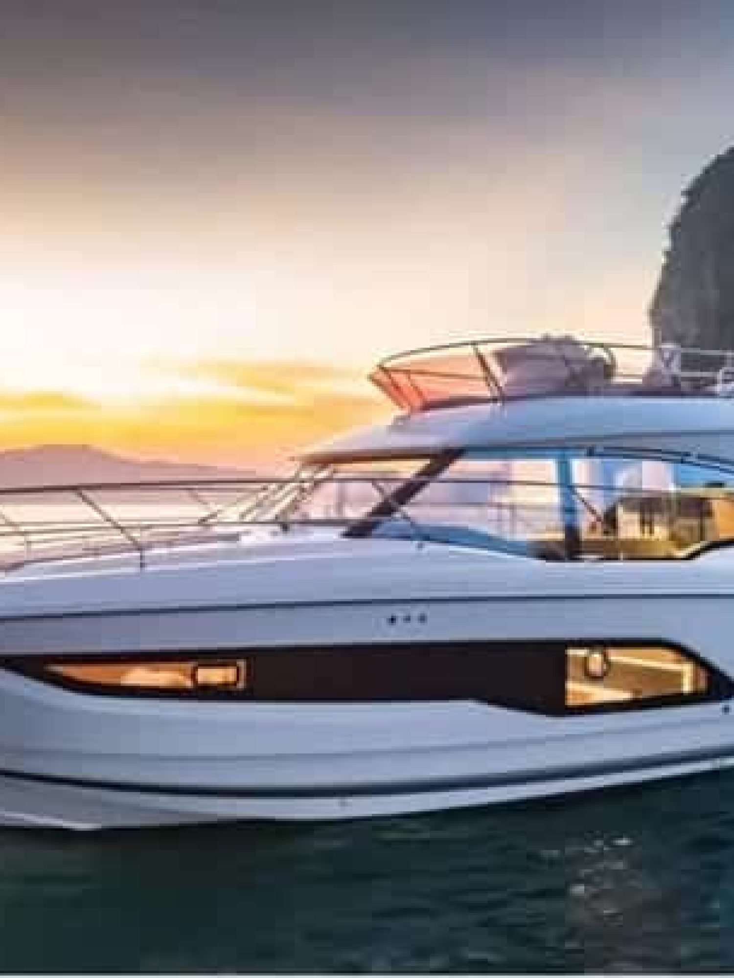 42' Prestige yacht illuminated by golden sunlight, creating a stunning luxury yachting experience.