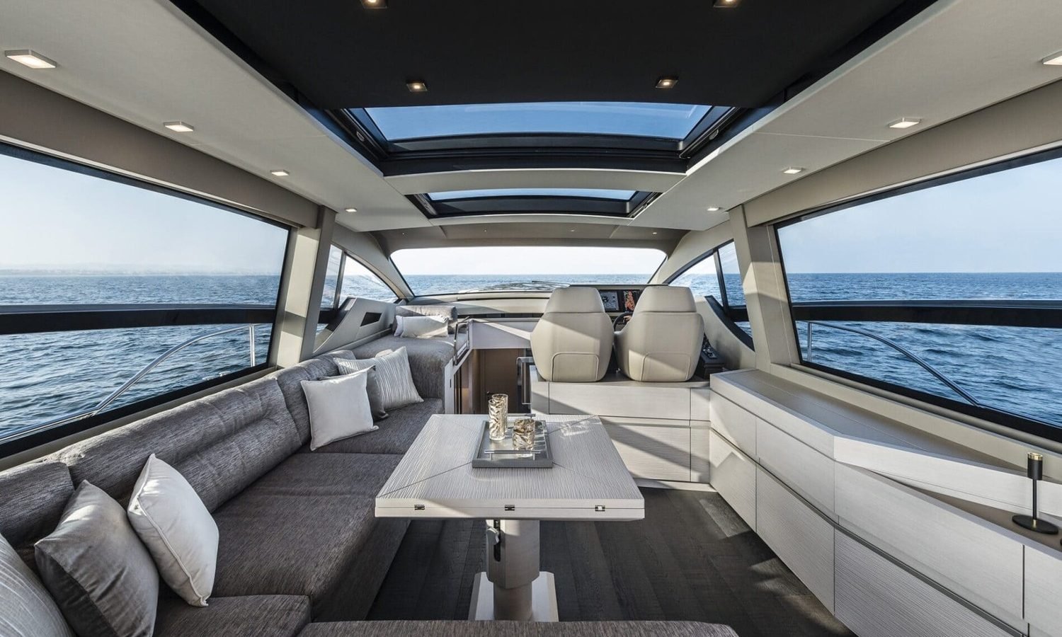 Another angle of the spacious interior of the 72' Pershing yacht, showcasing its luxurious living spaces.