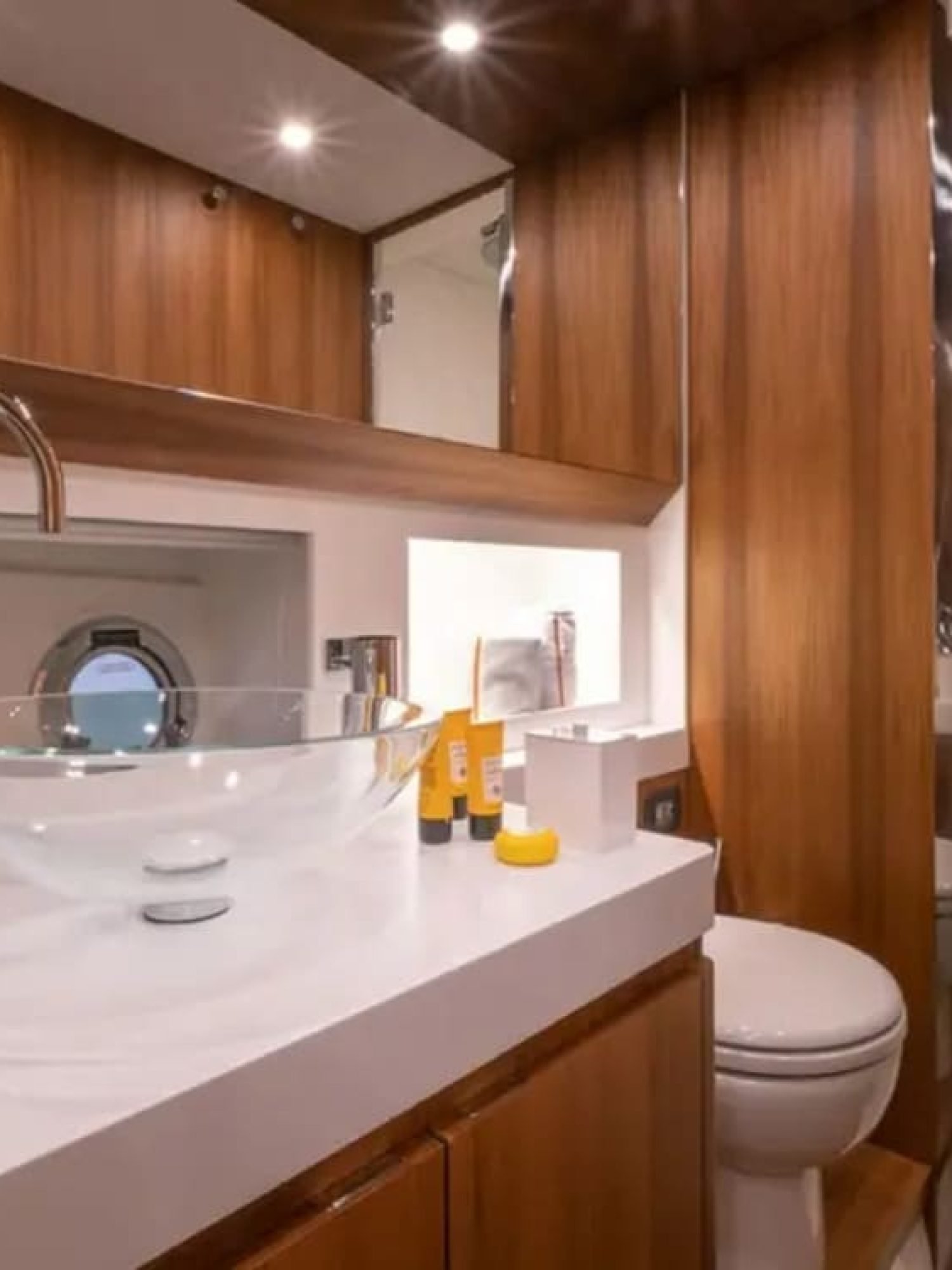 Modern and spacious bathroom on the 48' Solaris yacht with premium amenities.