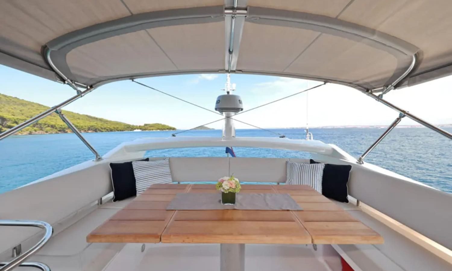 Croatia 3 Outdoor dining space with sofas on the 56' Sunseeker Manhattan yacht