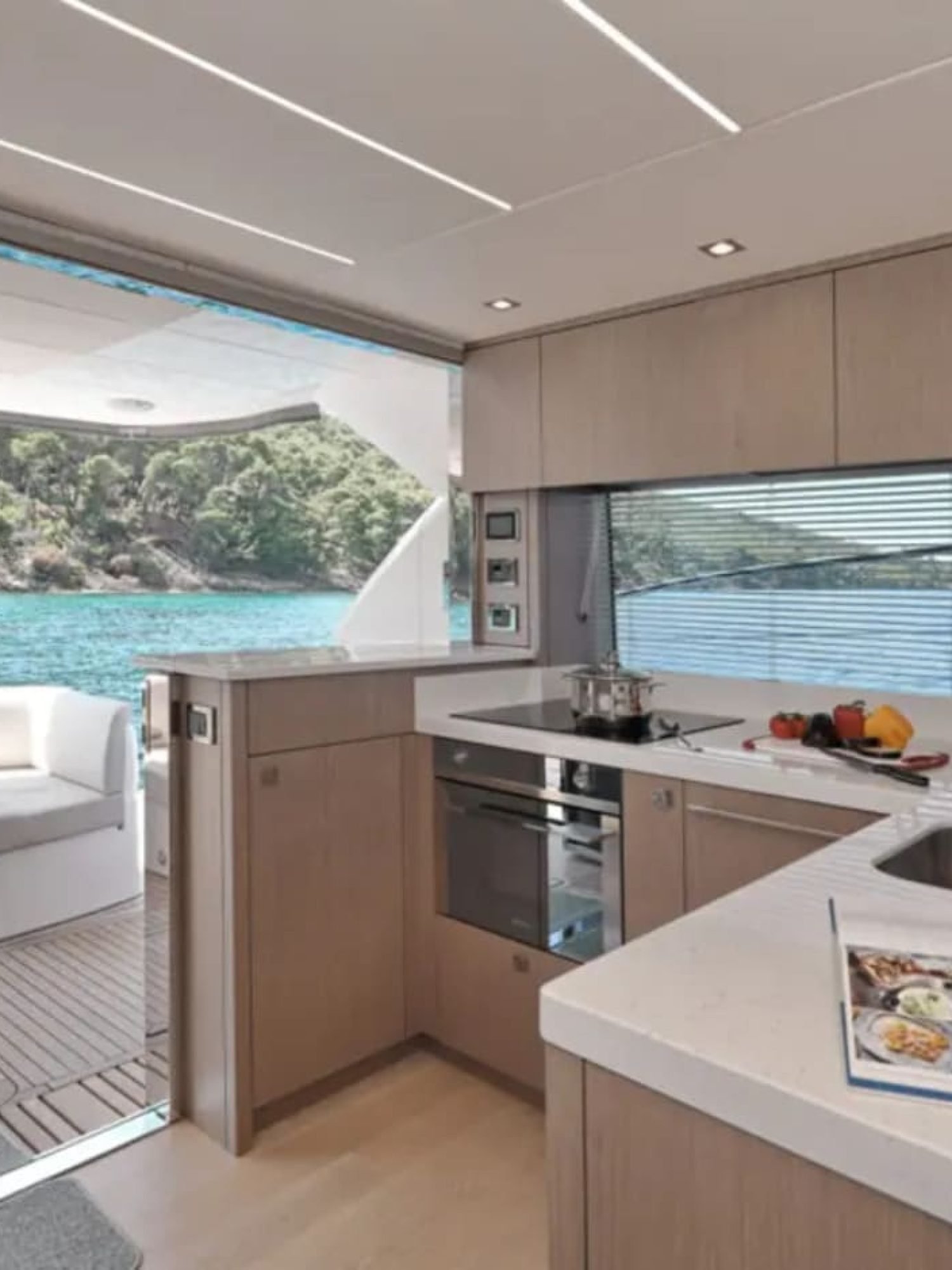 Modern kitchen with appliances inside the yacht