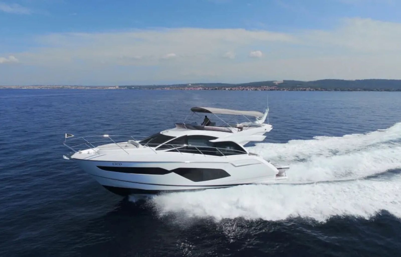 Side angle of the 56' Sunseeker Manhattan yacht on the water