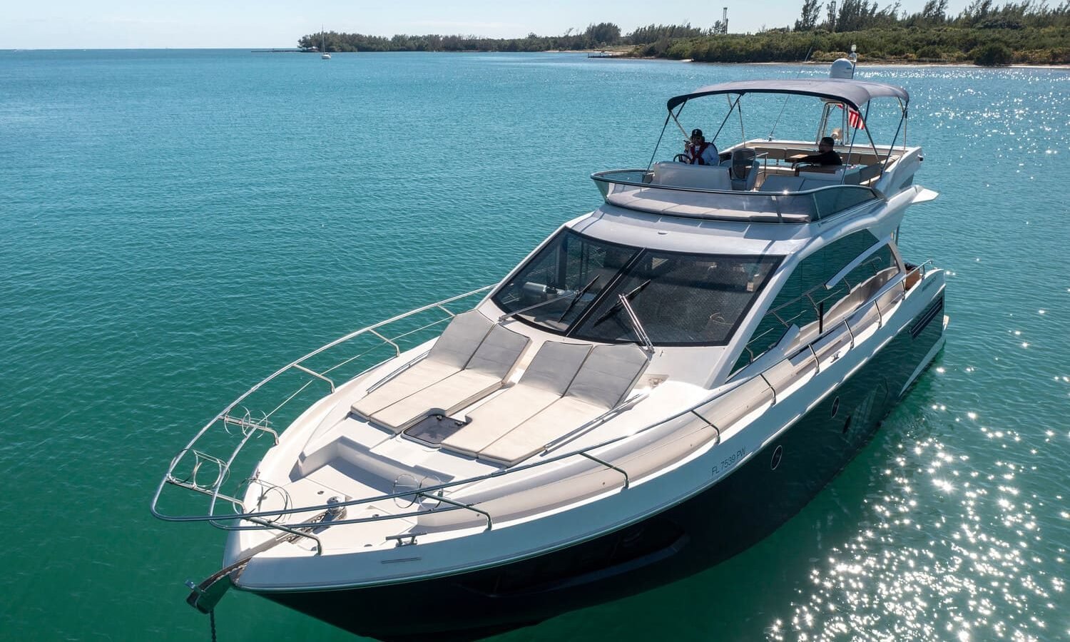 Exterior view of the 60' ABSOLUTE FLY yacht, showcasing its sleek design and luxurious features.