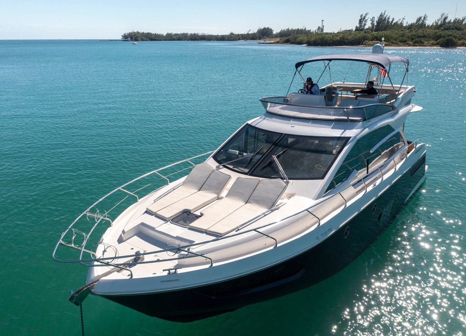 Exterior view of the 60' ABSOLUTE FLY yacht, showcasing its sleek design and luxurious features.