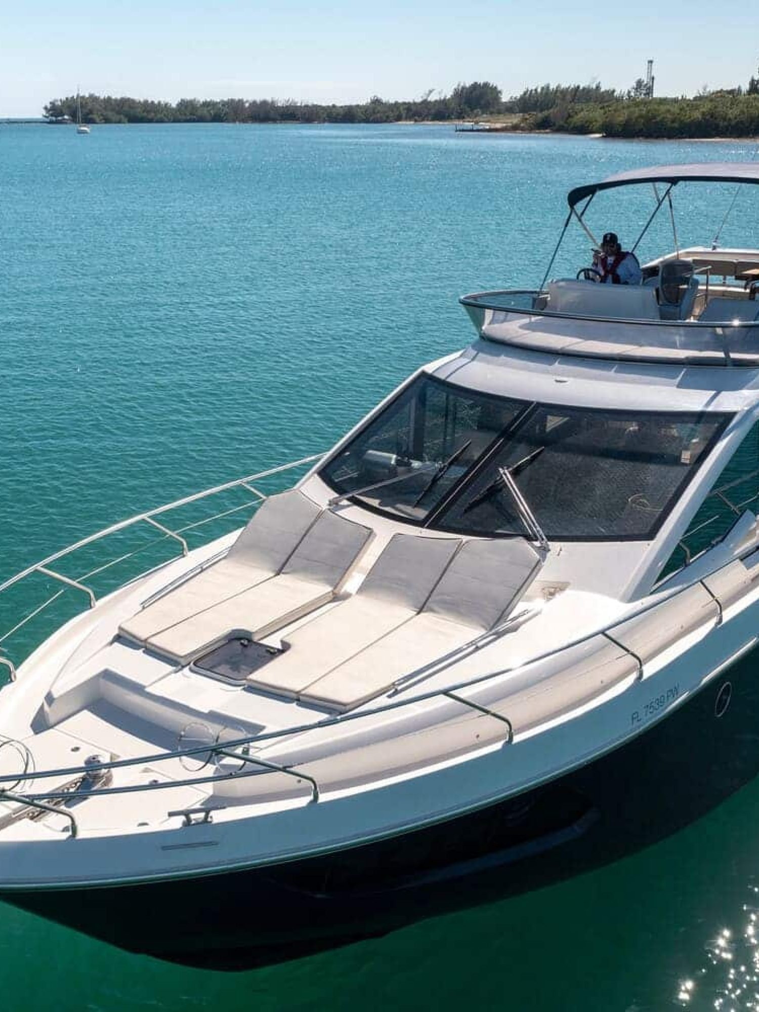 Exterior view of the 60' ABSOLUTE FLY yacht, showcasing its sleek design and luxurious features.