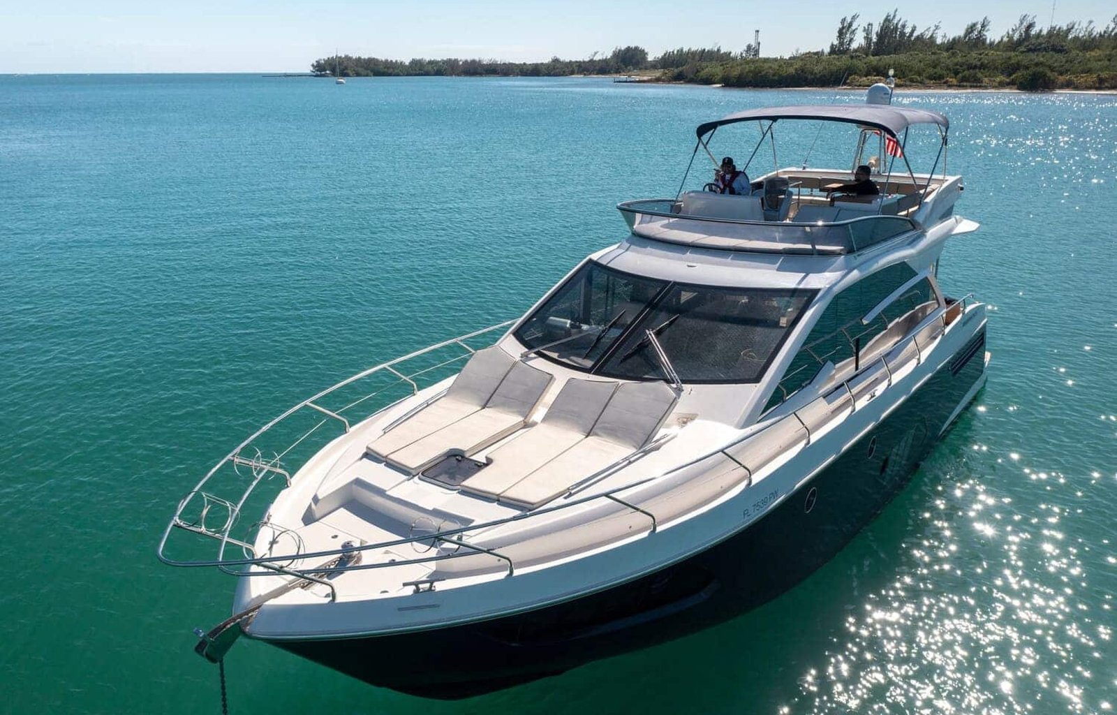 Exterior view of the 60' ABSOLUTE FLY yacht, showcasing its sleek design and luxurious features.