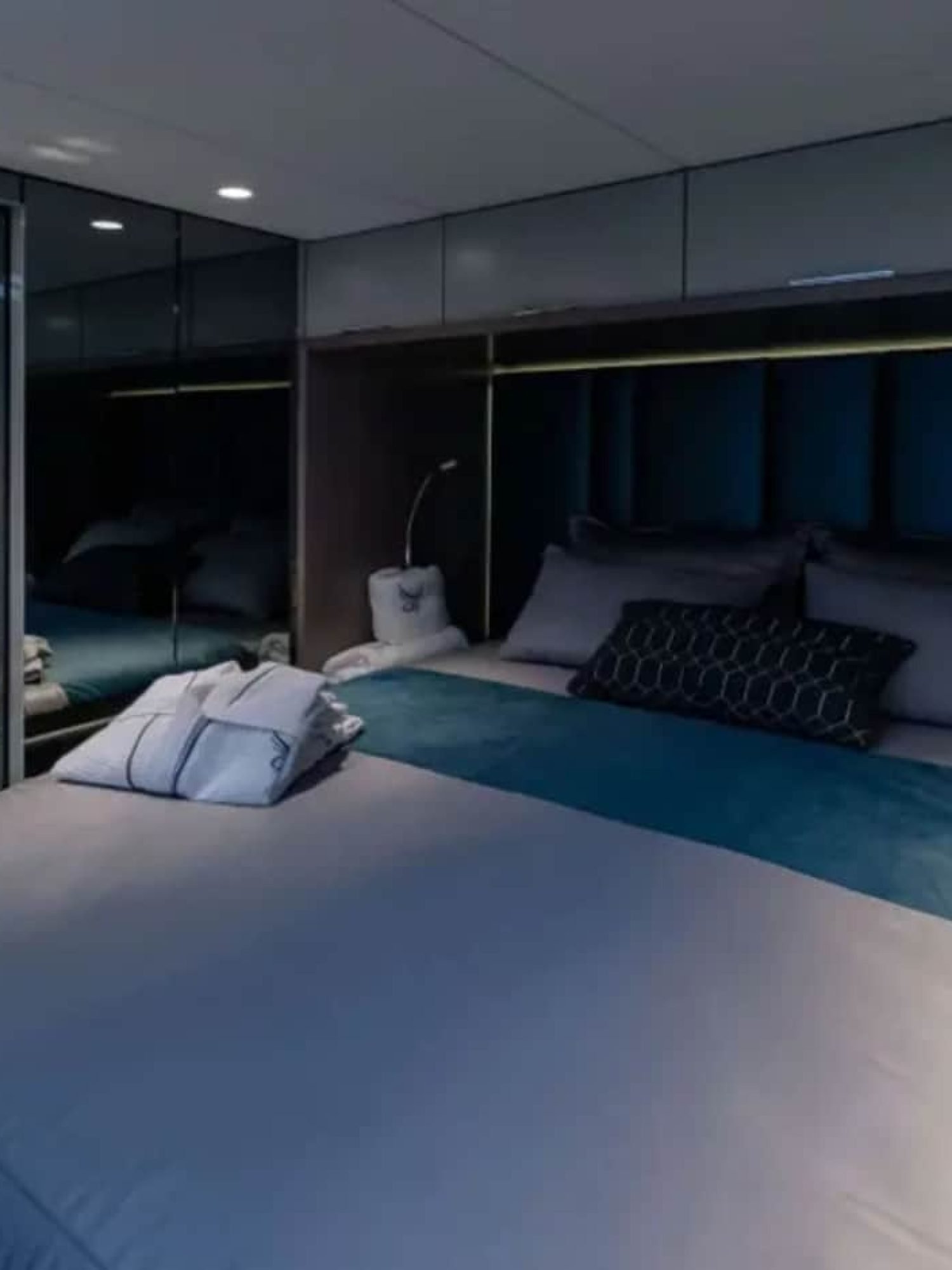 A beautifully designed guest bedroom on the yacht, offering a comfortable stay.