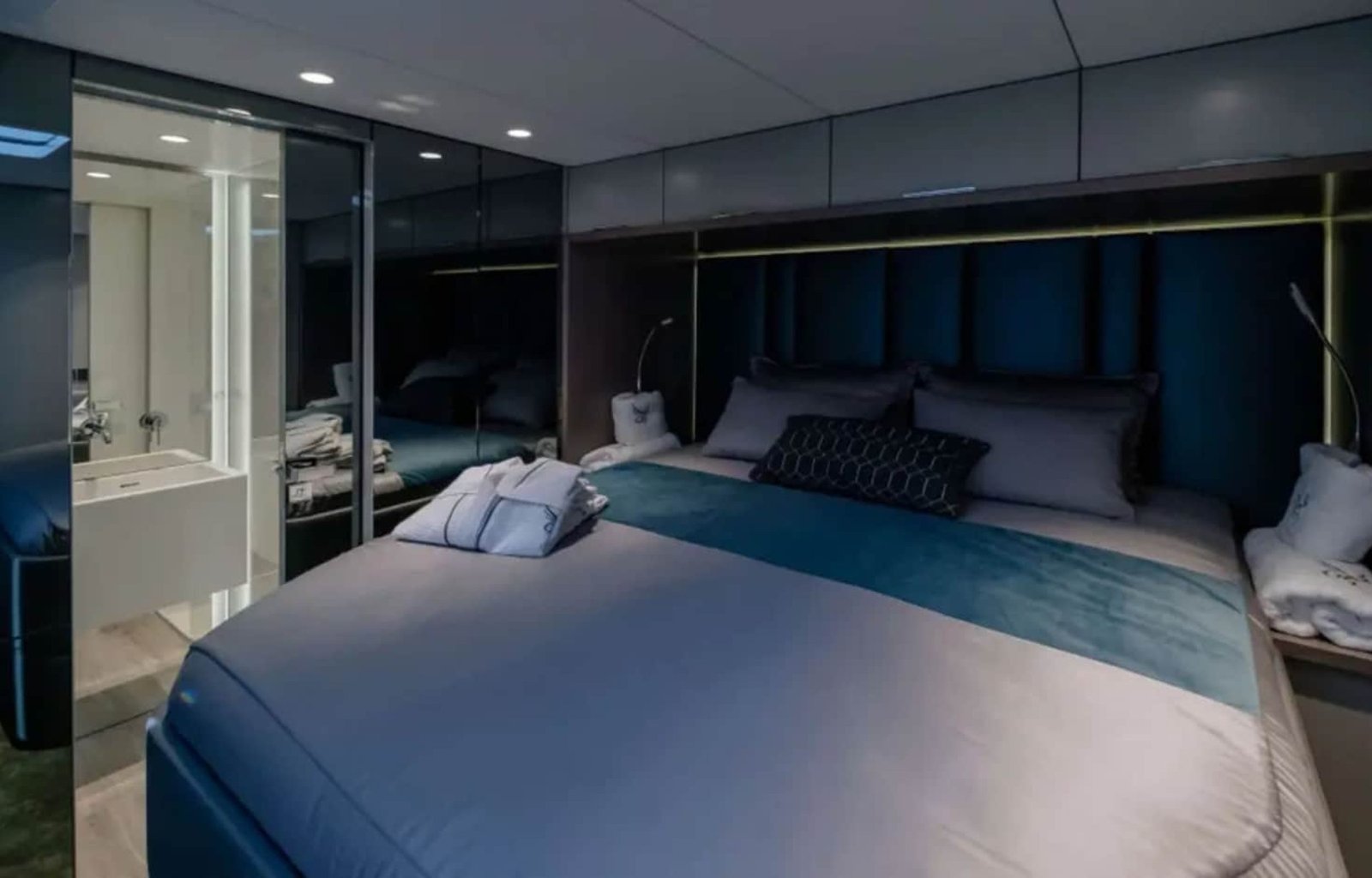 A beautifully designed guest bedroom on the yacht, offering a comfortable stay.