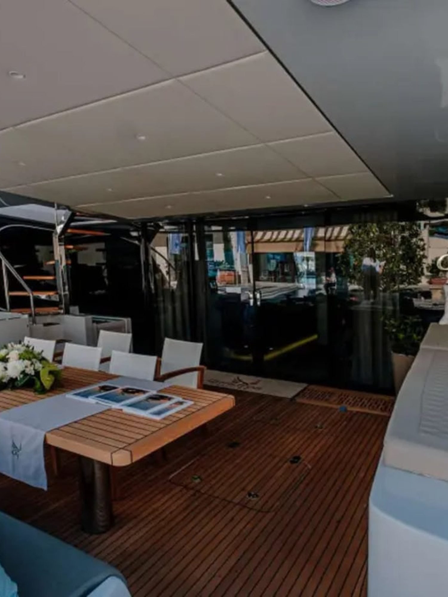 A spacious and stylish interior of the Sunreef 60 yacht, featuring modern decor and high-end finishes.