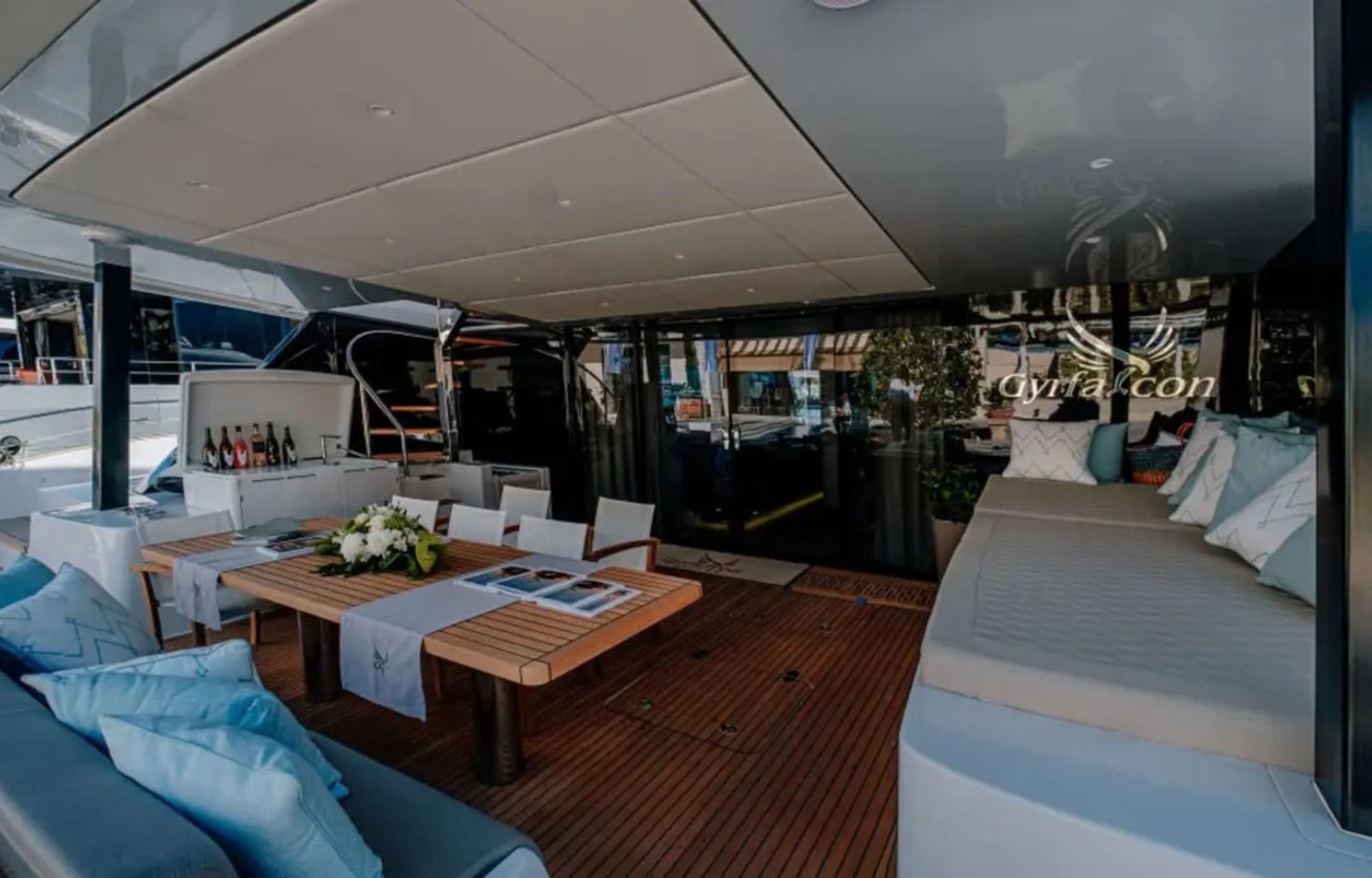 A spacious and stylish interior of the Sunreef 60 yacht, featuring modern decor and high-end finishes.