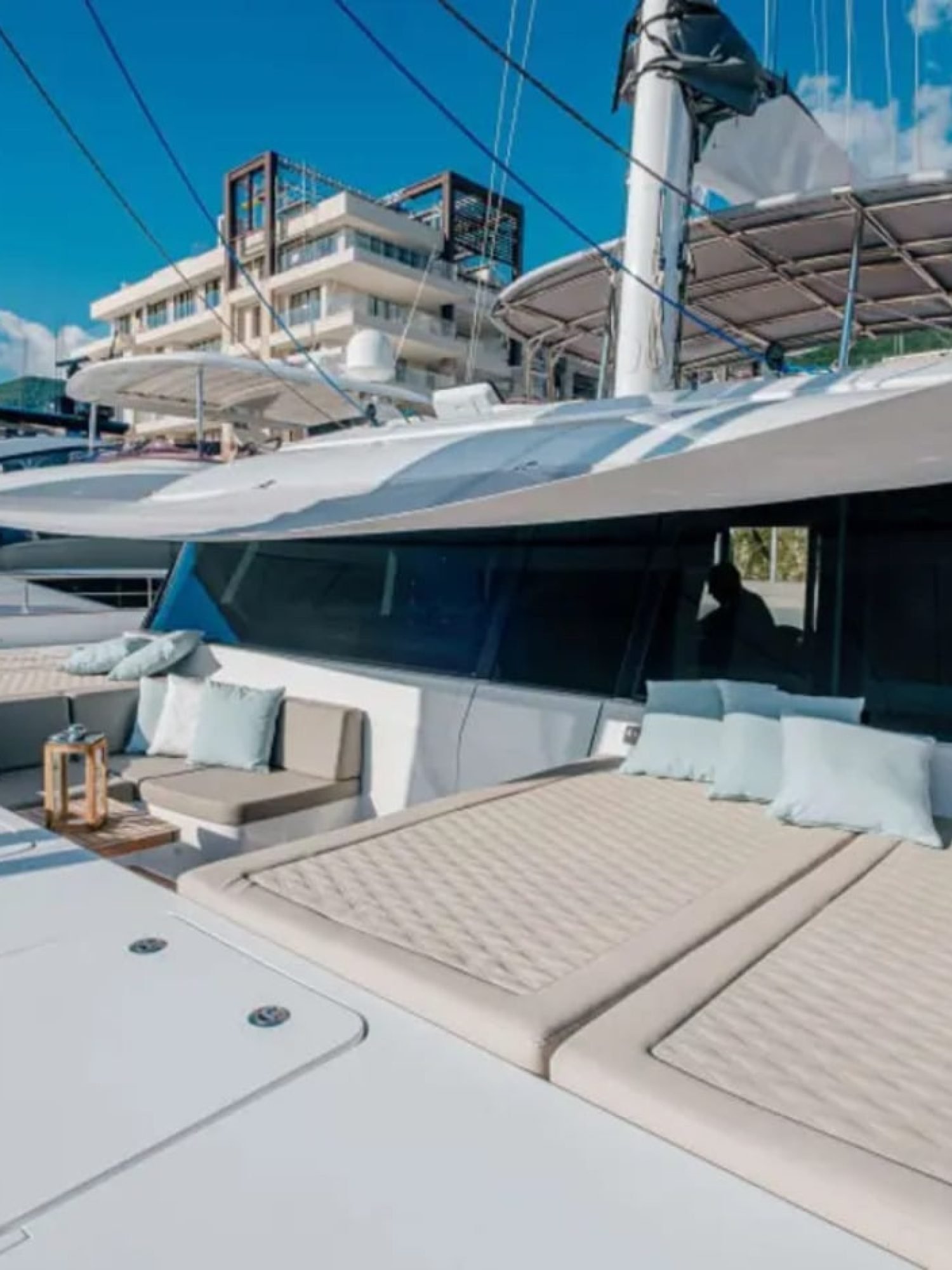 The luxurious deck of the yacht, equipped with elegant seating and a perfect ocean view.