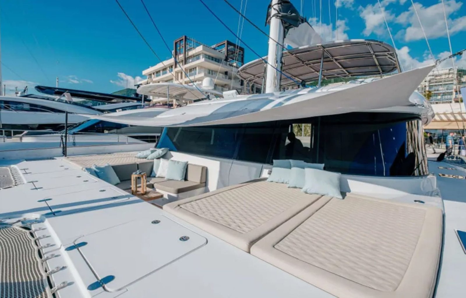 The luxurious deck of the yacht, equipped with elegant seating and a perfect ocean view.