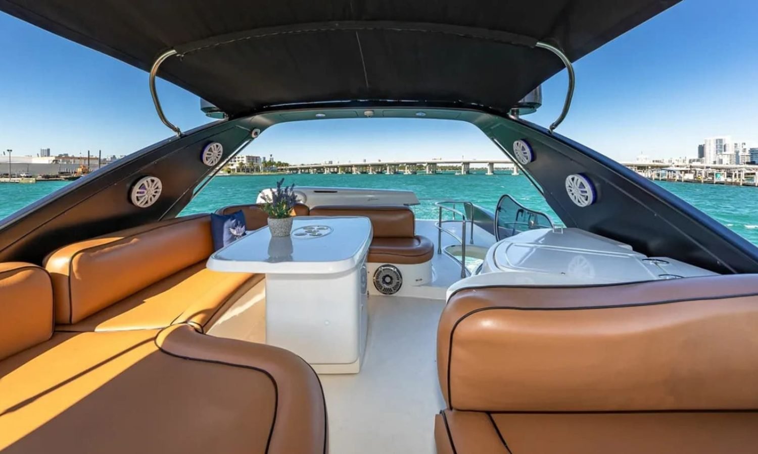 Interior seating area aboard the 62' AZIMUT REGAL yacht, designed for luxury and relaxation.