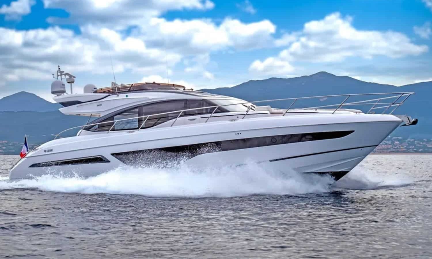 Exterior view of the 66' Princess yacht, showcasing its sleek design and spacious deck.