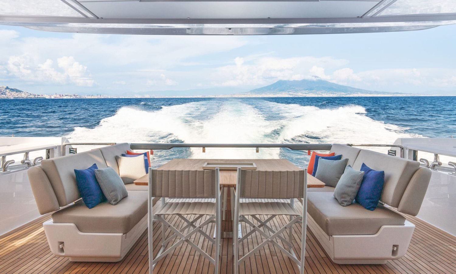 Bahamas 8 Elegant alfresco dining area on the 88' FERRETTI yacht with a luxurious table setup and panoramic sea views
