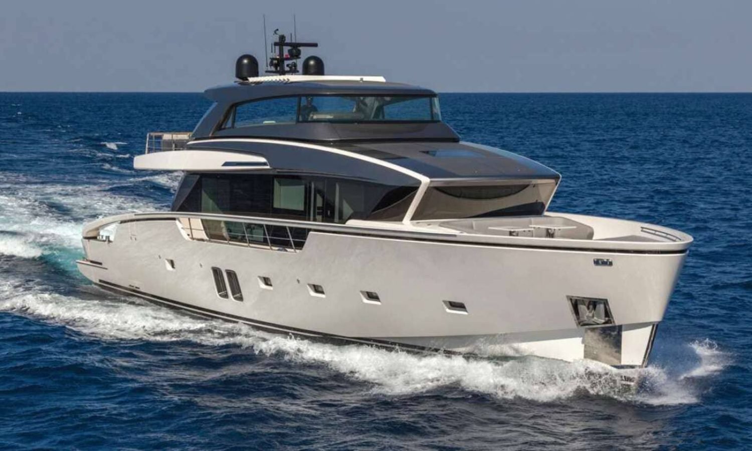 Ibiza 13 A different angle of the 82' Sunseeker for charter, highlighting its streamlined structure and luxury appeal.