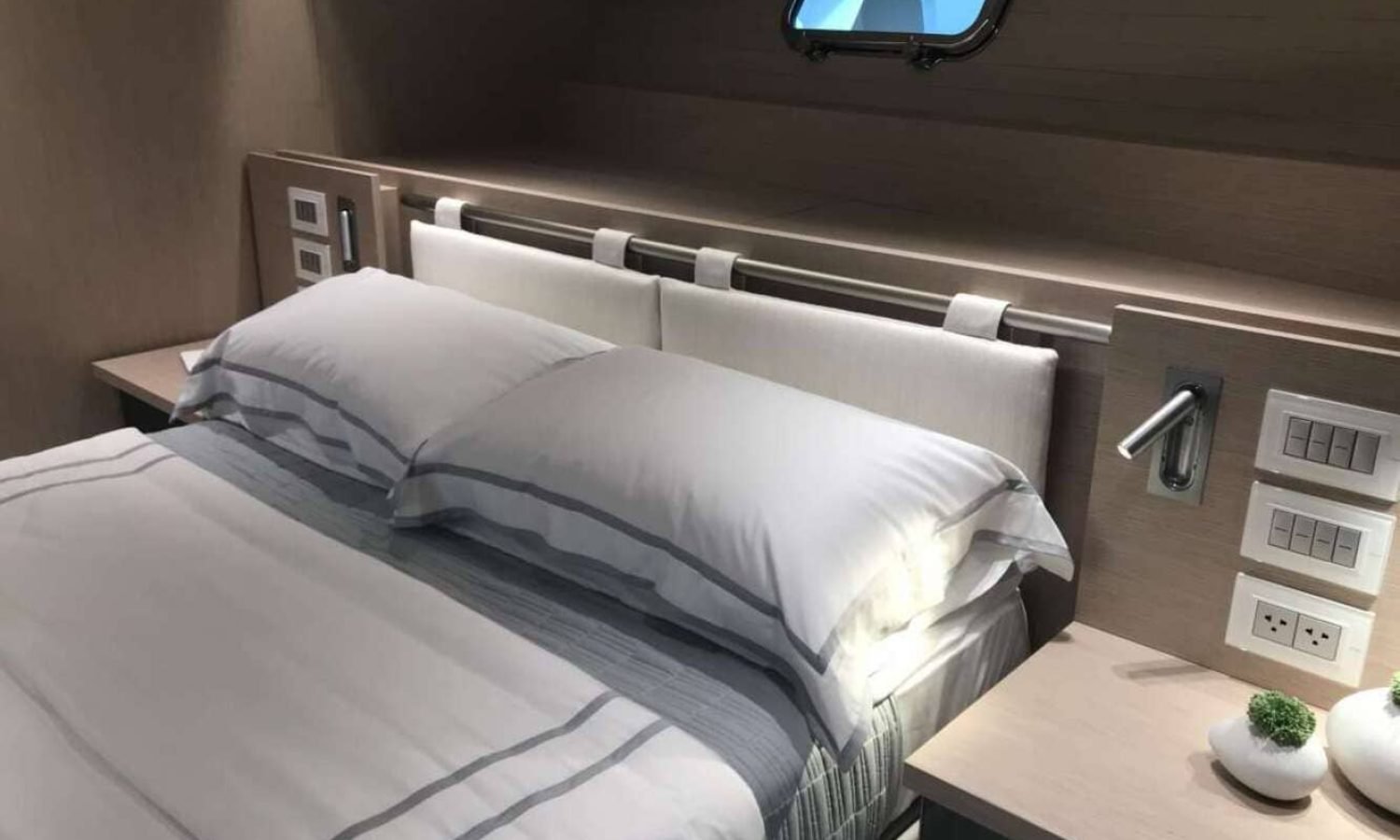 Ibiza 15 Alternate view of the guest stateroom on the 82' Sunseeker, showcasing premium furnishings.