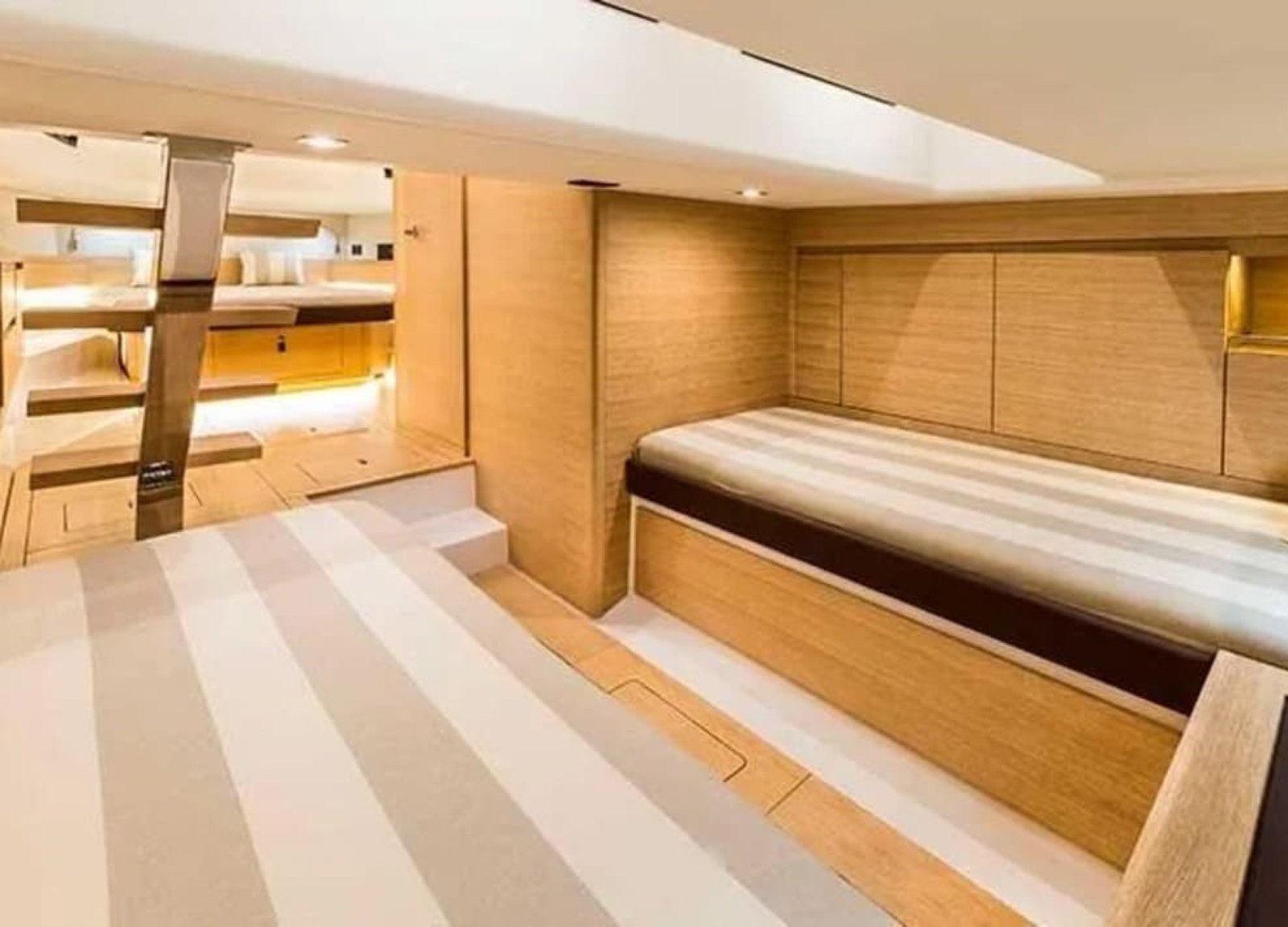 Another exquisite stateroom on the 43' Pardo yacht, designed with sophisticated decor and maximum comfort for your enjoyment