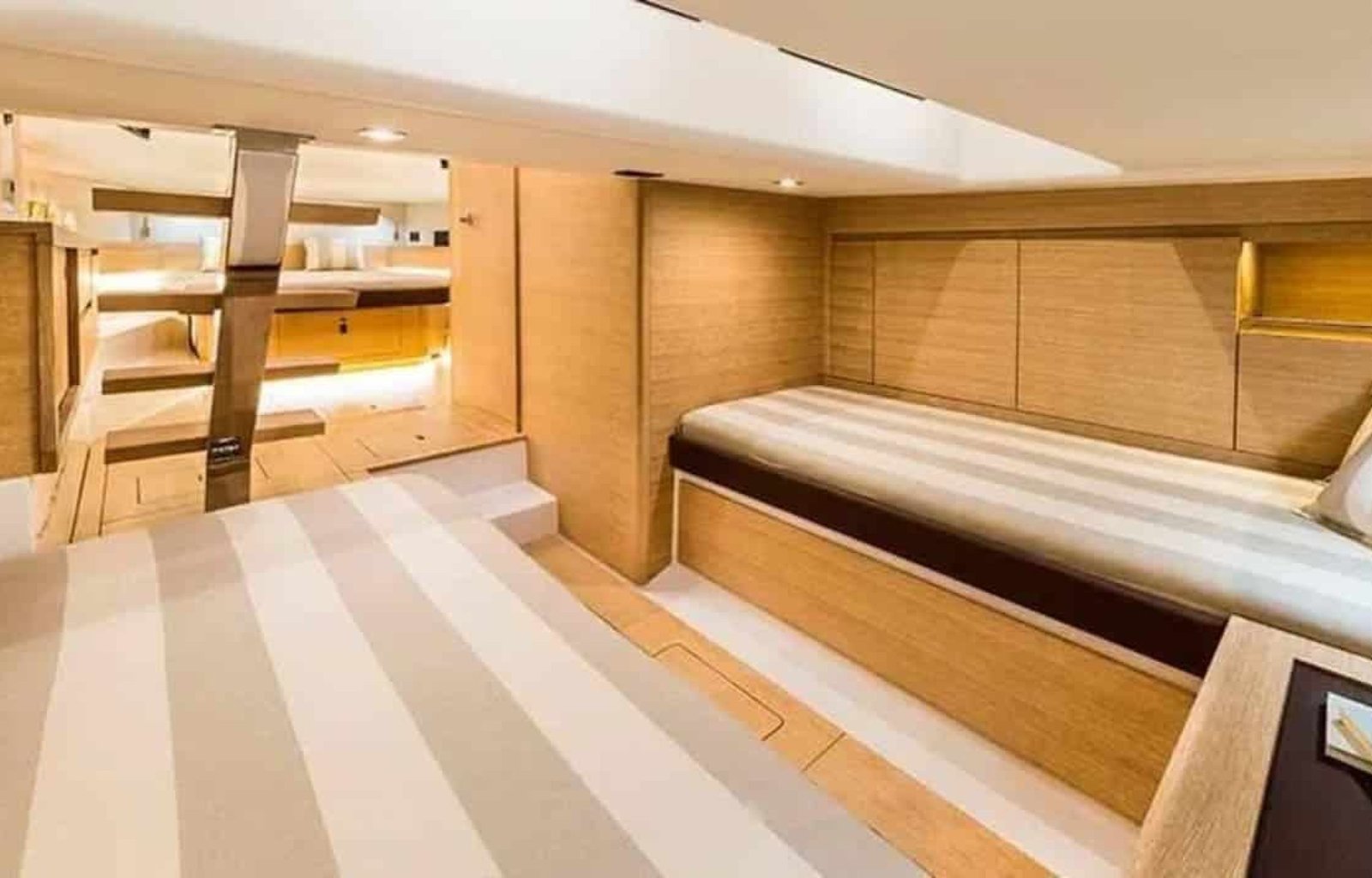 Another exquisite stateroom on the 43' Pardo yacht, designed with sophisticated decor and maximum comfort for your enjoyment