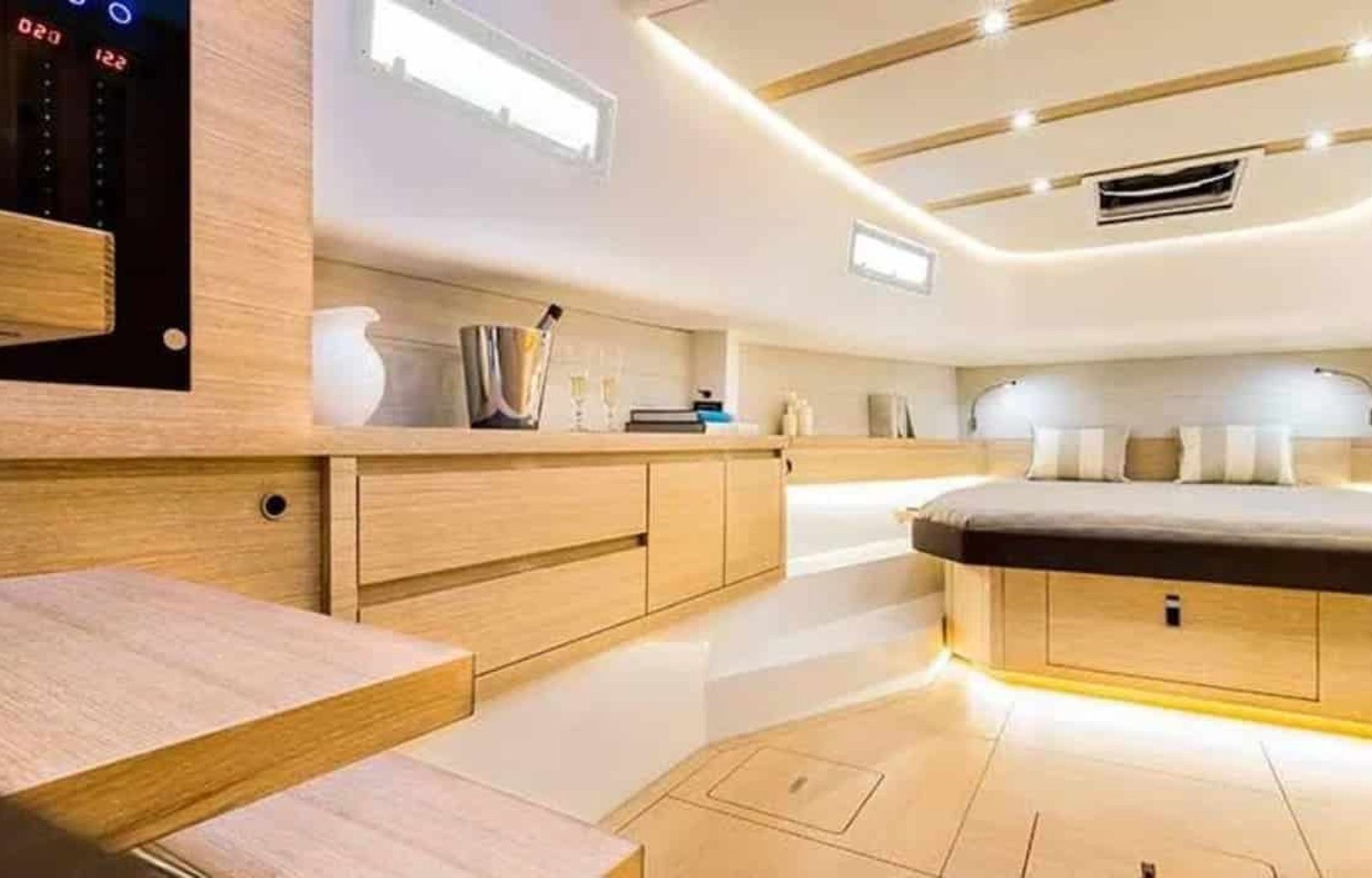 Luxurious bed aboard 43' Pardo yacht, featuring soft bedding for a relaxing sleep