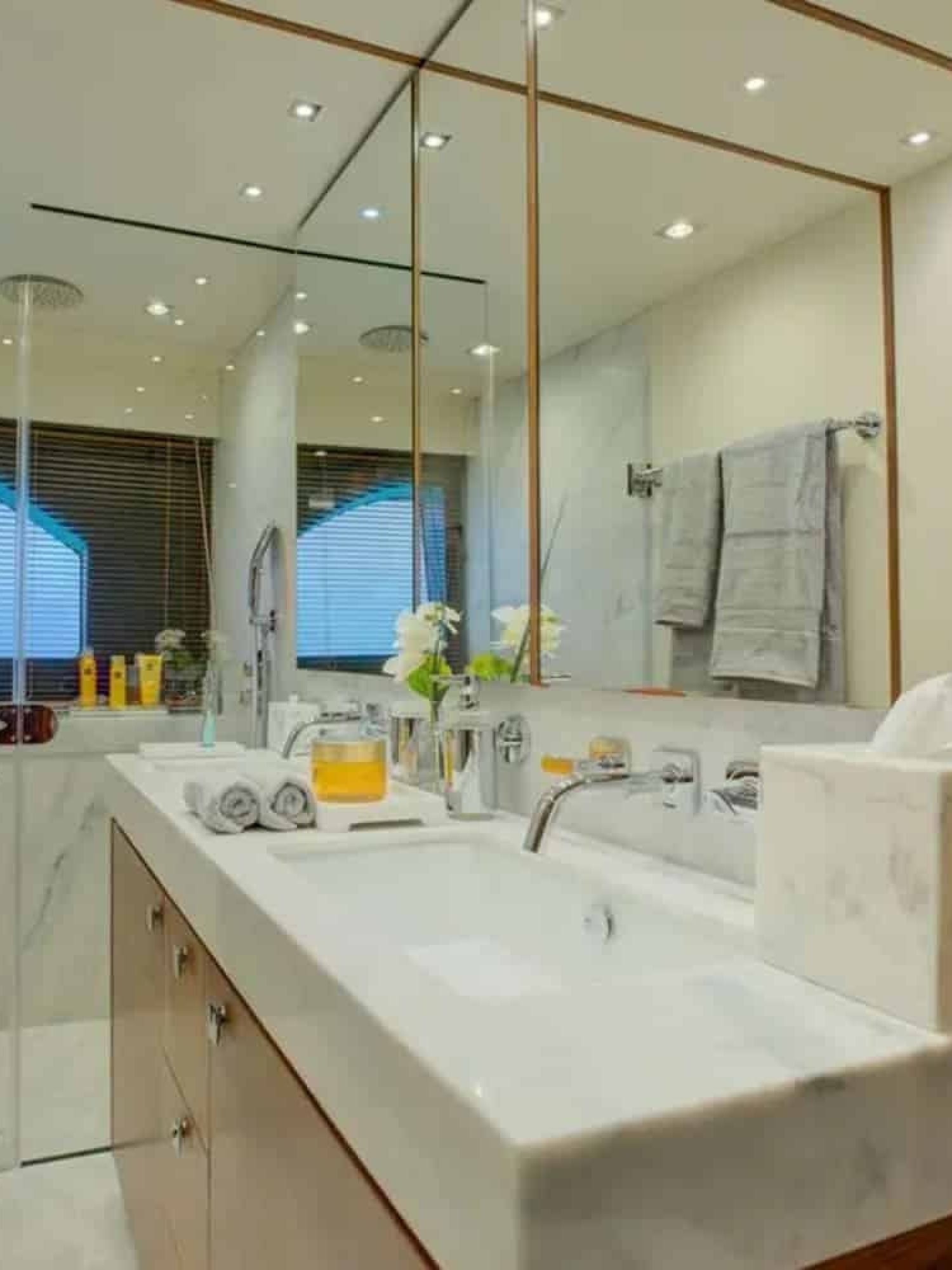 Luxurious and contemporary bathroom onboard the yacht.