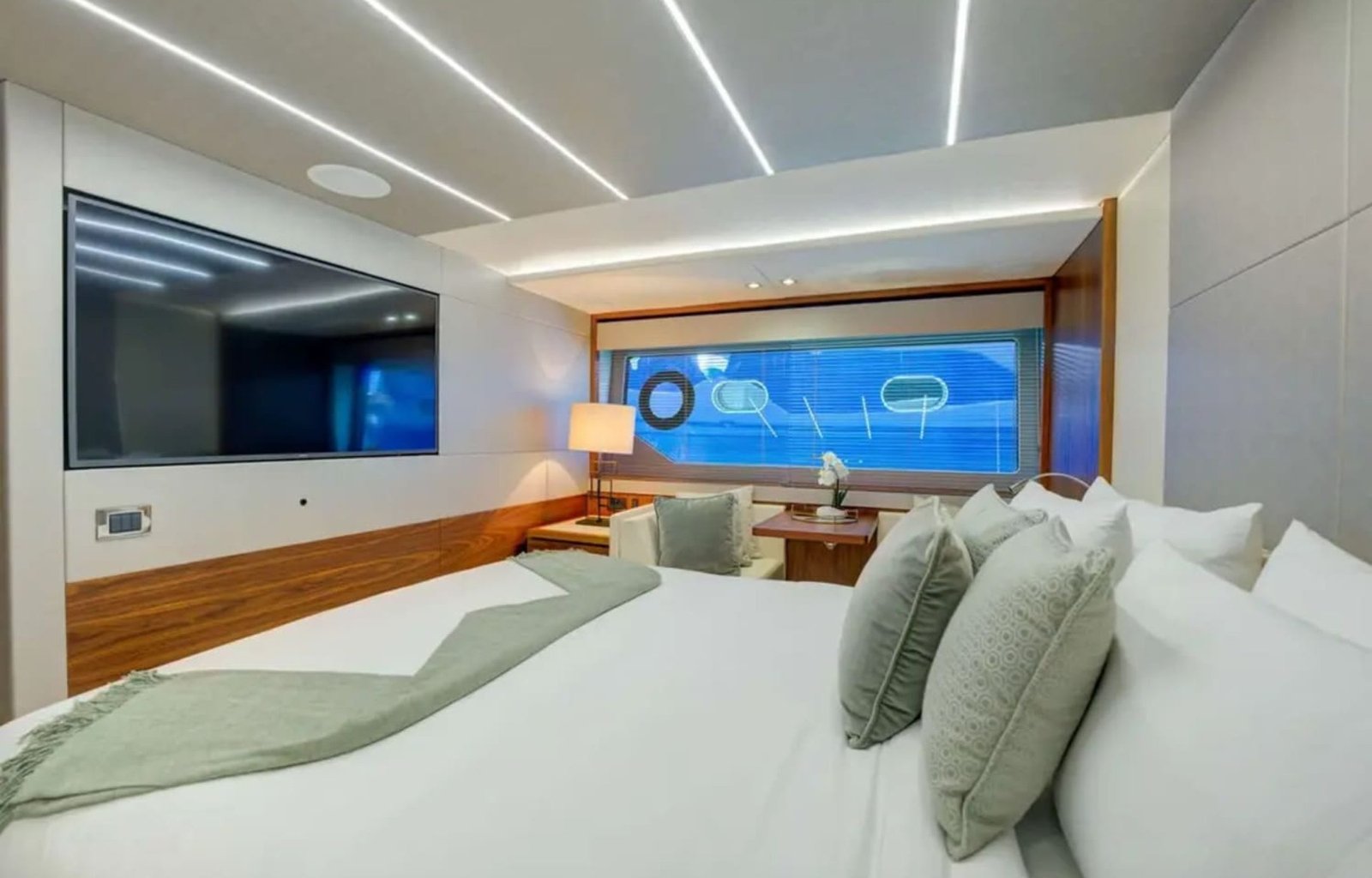 Spacious master stateroom with sophisticated decor and premium amenities.