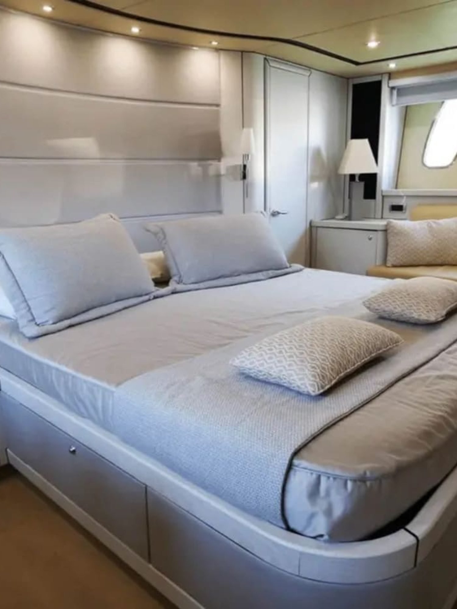 Spacious master suite aboard the 82' Sunseeker with luxury finishes.