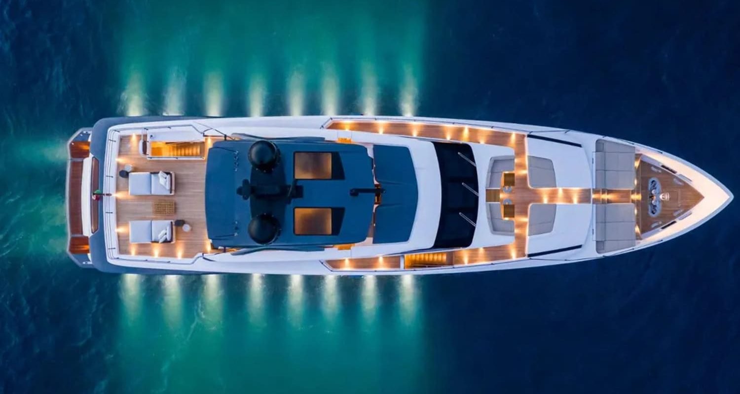 Aerial view of the 106' CUSTOM LINE yacht showcasing its sleek design.