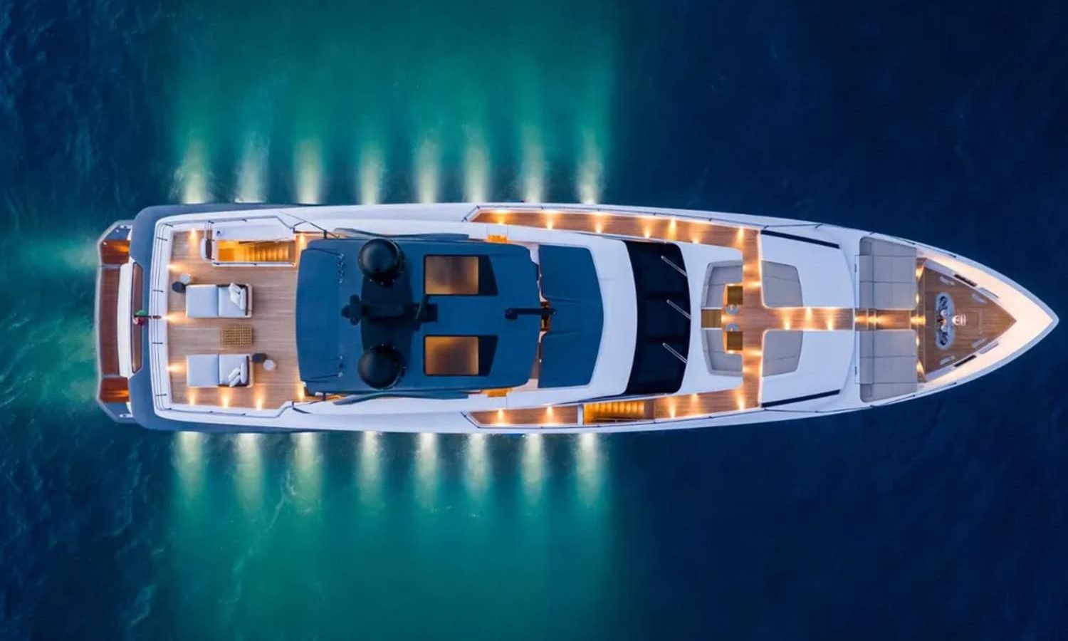 Aerial view of the 106' CUSTOM LINE yacht showcasing its sleek design.